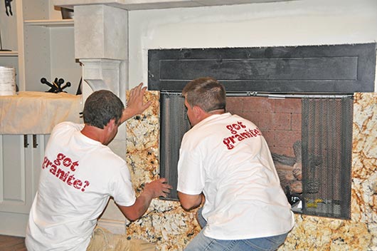 Installing a granite fireplace surround