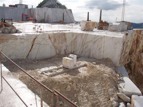 Production takes a breather as the saws, loaders and backhoes sit idle in this hillside quarry of Statuary in the Apuan Alps of Carrara. The demand for premium materials like Statuary are being driven by both designers and their clients wanting a clean and neutral look for their upscale creature comforts, and in doing so have driven the price up and availability down. 