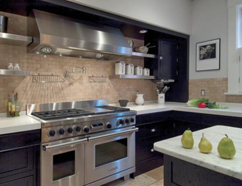 This combination of old and new includes a Carrara island with laminated Blizzard White Caesarstone countertops. The house is in the historic Richland-West End Area of Nashville. 