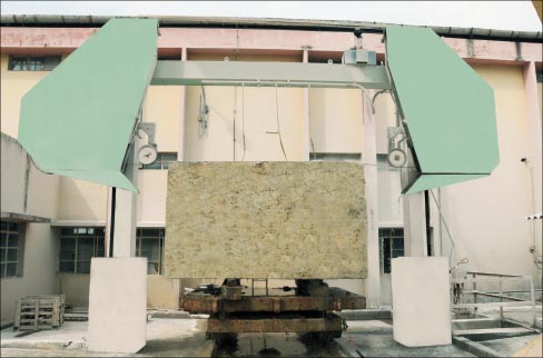 This monowire saw dresses the uneven blocks into even blocks on 4 sides to prepare them to be cut in the Gangsaw machines. There are 3 monowires at Madhav Marbles & Granites Limited.