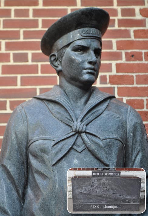 Hand-carved from Absolute Black granite to honor one of the oldest surviving members of the USS Indianapolis, a life-sized statue of World War ll veteran Jimmy O’ Donnell was installed on a special bas relief pedestal in City Market, Indianapolis, Indiana. The statue was sponsored and proposed by Forrest Lucas of Lucas Oil and Mayor Greg Ballard of Indianapolis. 