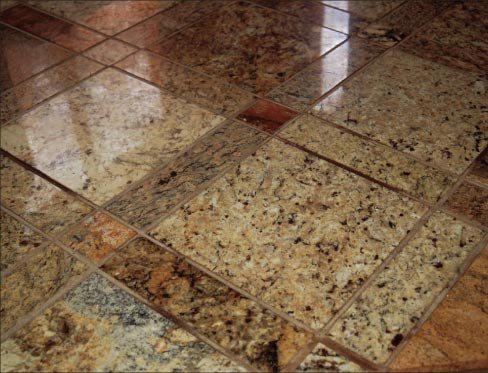 Yarbrough worked out a repeating pattern to use six common colors and types of granite remnants. After collecting pieces of the right stone over a period of years, the tile was cut to size, the four edges given a slight bevel and polished, sealed and installed throughout the foyer and kitchen. Similar flooring is used in other rooms.