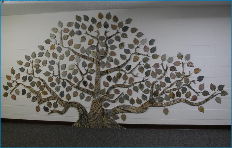 Rocky Mountain Stone has produced a number of intricately cut “giving trees” using their waterjet saw. This tree features a rainforest green marble trunk with colorful Indian Autumn slate leaves. 