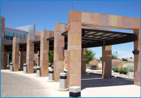 A 2005 cladding  job for the PMG High Resort office building has about 15,000 square feet of mechanically anchored Indian High Desert Red Sandstone.