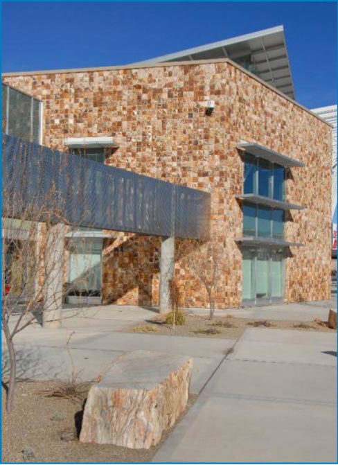 The UNM basketball arena, aka “The Pit,” features Vista Grande Onyx Splitface from New Mexico Travertine.