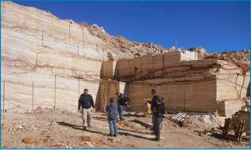 Jim Lardner conducts a group tour of the New Mexico Travertine quarry of West Belen, New Mexico.