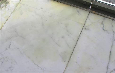 Yellowing, discoloration and rusting from oxidation are common problems  seen in white marbles after flooding.