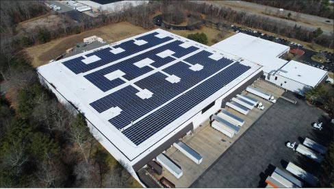 Belknap White’s Mansfield, MA plant with solar collectors installed.