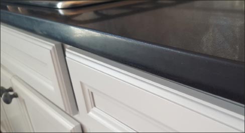 Don’t use wax or color enhancer to “fix” burned edges. It is not a permanent solution, will last maybe a year, and will lead to very unhappy former customers.