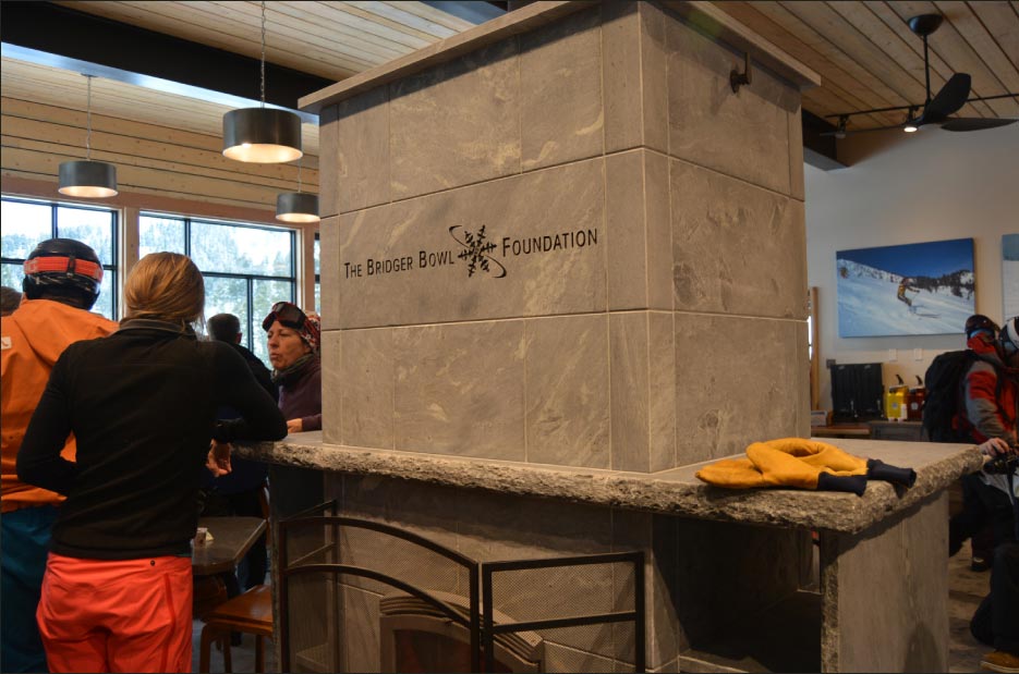 A soapstone stove is a focal point in a “warming hut” at the Bridger Bowl ski area.