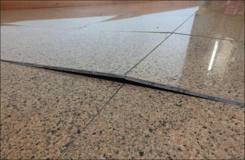 Tile tenting can happen to granite, marble or porcelain tile flooring. Sometimes it is not even the installer’s fault – but most often, it is. I examined four clues to determine whether this failure was a poor installation – and you can learn how, in my upcoming class.