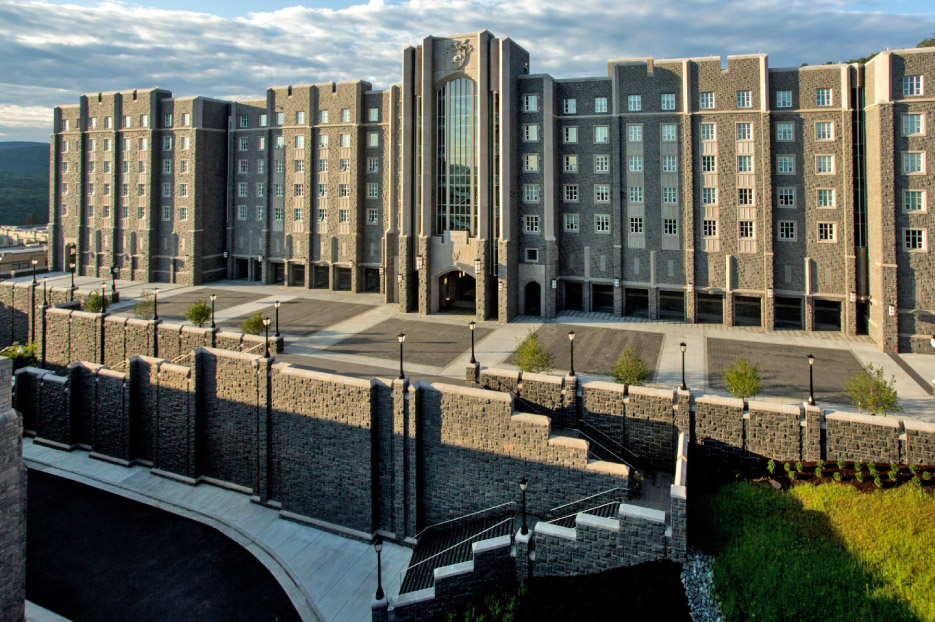 West Point Cadet Barracks. Charcoal Black Split Face and Mesabi Black were used for exterior cladding (Charcoal), flooring, interior stone facing, signage, site furnishings, staircases/steps, and pillars.