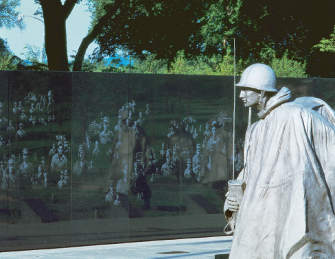 Korean War memorial: The design is a formation of four 16-foot tall granite clad columns surrounded by four granite walls – each column representing one year of the Korean War.  Thermal polished Academy Black granite was chosen to create a clear background for the memorial’s artwork, which was transferred and carved into the stone.  Philadelphia, PA. 