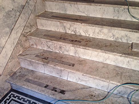 (before) Historic Alaskan Tokeen marble entry steps in another stately, old apartment building in Portland.  Common to old construction in Portland