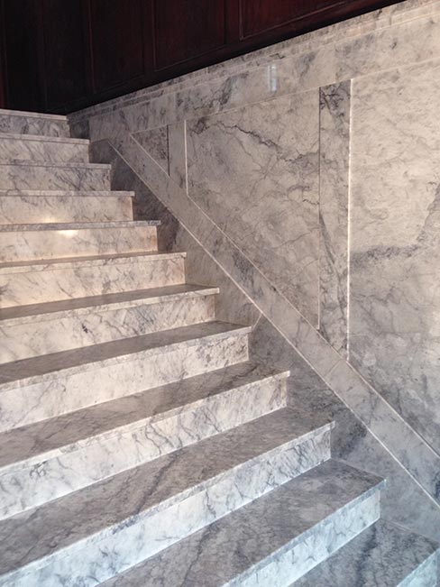 (after) Historic Alaskan Tokeen marble entry steps in another stately, old apartment building in Portland.  Common to old construction in Portland,  Wiley has repaired several steps similar to this in the area.