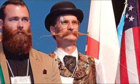 The winner, Madison Rowley (left), in the most elegant and sportsman-like conduct turned and bowed first to his fellow competitors, waving his arms to signal the audience to follow suit.