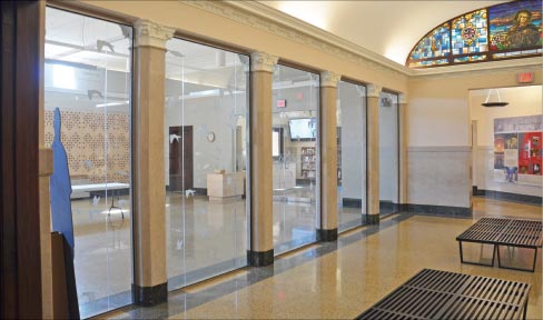 New Visitor’s Center vestibule and access ramp after restoration, and below, before remodeling.