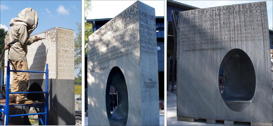 Kelly Nickol, of Fast Blast, sandblasting the quotations about public service that run horizontally around all four sides of the sculpture.