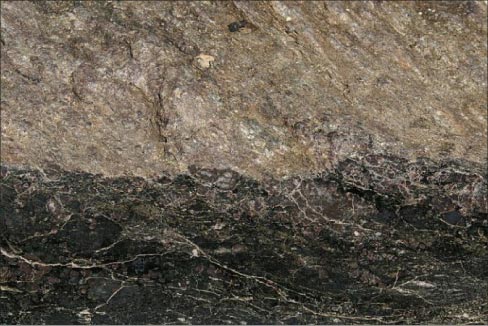 Vishnu schist: this 1.75 billion year old rock is found in the Grand Canyon.