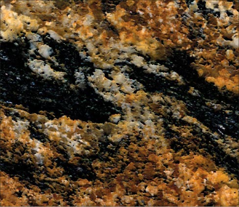 Polished slab of Magma Gold schist, and a closeup of a leather treatment, which brings out the different, large-grained textures of the minerals.