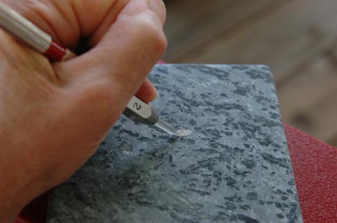 Soapstone is the oddball of natural stones: it is normally impervious to most acids, yet some types are soft enough to carve with a kitchen knife.