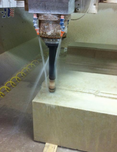 Testing a block-boring bit on limestone, on a Northwoods CNC machine.