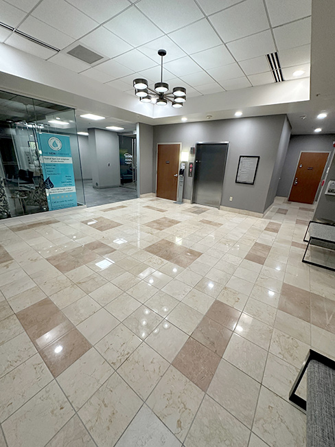 Another of the eight lobbies restored. Notice there are none of the darker tiles in this floor.