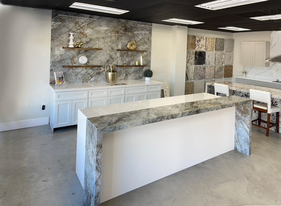 Zsolt Granite Showroom kitchen vignette showcases an elegant, modern design esthetic.